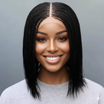 Load image into Gallery viewer, Woman with styled hair against a gray background
