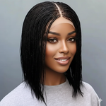 Load image into Gallery viewer, Woman with styled hair against a gray background
