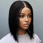 Load image into Gallery viewer, Woman with styled hair against a gray background
