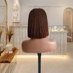 Load image into Gallery viewer, Mannequin head with a brown bob wig in a stylish interior setting
